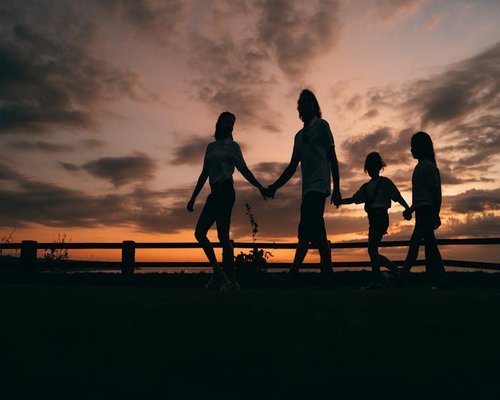 Family taking an evening walk together